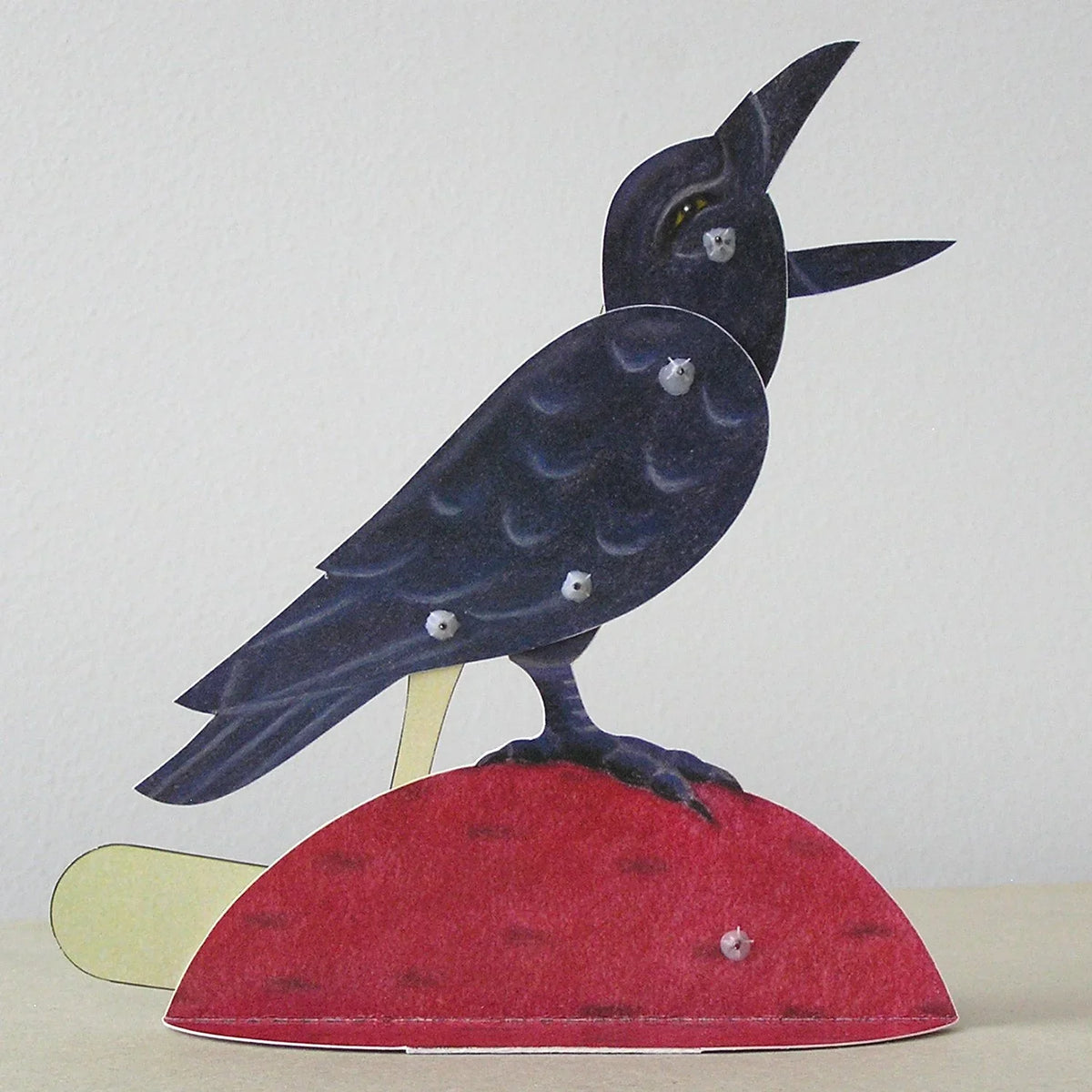Bliss Kolb’s handmade paper crow automaton, illustrating the Seattle artist’s mechanical artwork discussed in the Kelly Clarkson bird dispute