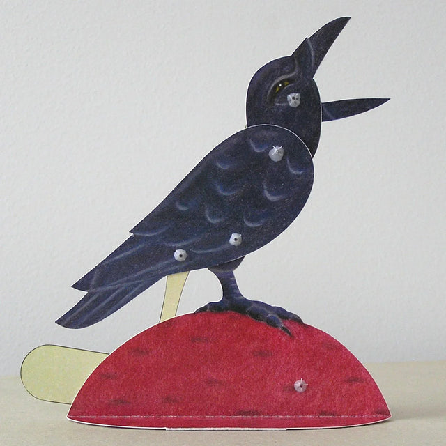 Bliss Kolb’s handmade paper crow automaton, illustrating the Seattle artist’s mechanical artwork discussed in the Kelly Clarkson bird dispute