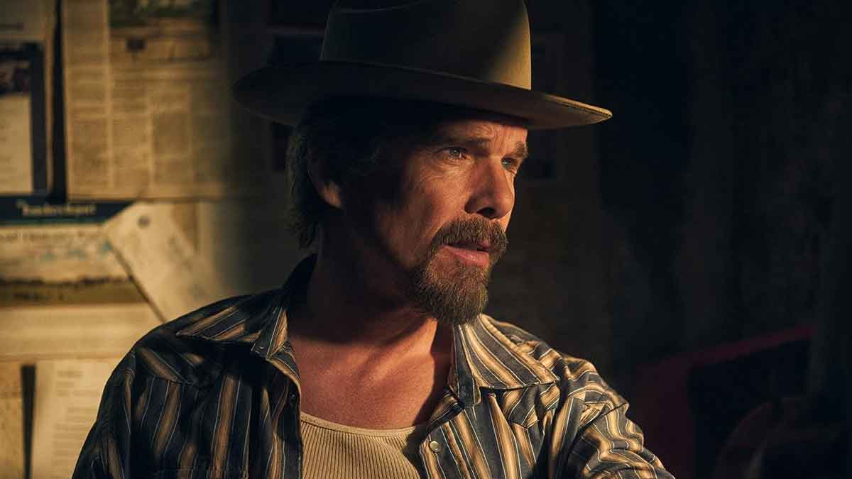 Ethan Hawke as Lee Raybon in The Lowdown, wearing a cowboy hat in a moody close-up