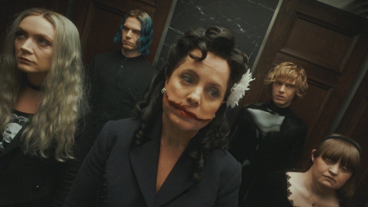 American Horror Story Season 13 Rauhnacht episode still with Billie Lourd Evan Peters Mena Suvari
