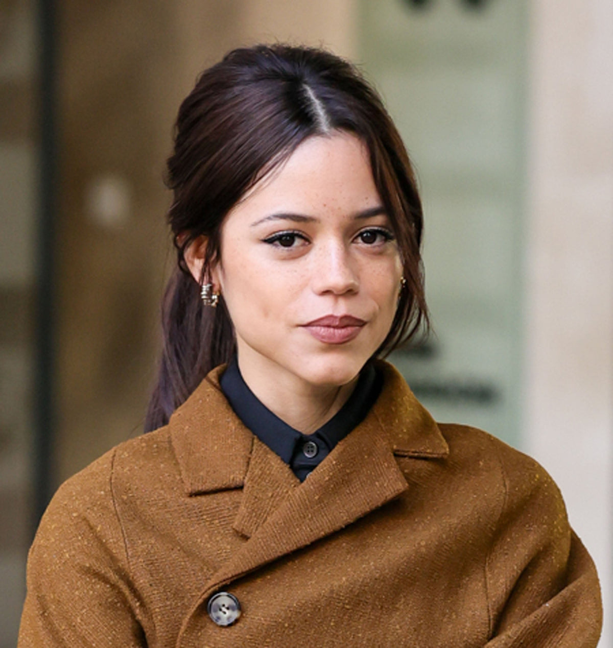 Jenna Ortega wearing darker, defined eyebrows during her October 2026 London appearances