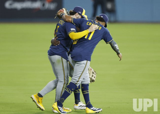 Milwaukee Brewers players celebrate after beating the Los Angeles Dodgers in NLCS Game 3 on October 14, 2026