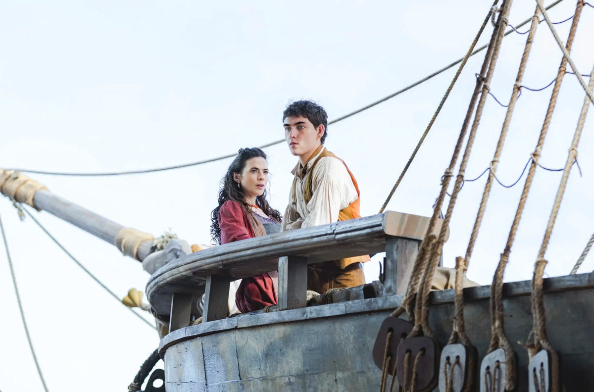 Hayley Atwell as Bess Hawkins and Tom Sweet as Jim Hawkins aboard the ship in Treasure Island