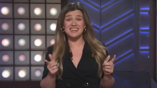 Kelly Clarkson in a studio portrait accompanying coverage of the Kelly Clarkson and Art of Play dispute