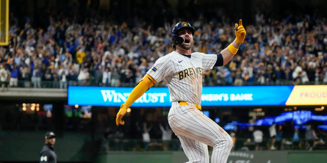Milwaukee Brewers outfielder Garrett Mitchell celebrates during an earlier postseason game