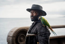 David Oyelowo as Long John Silver with his parrot in the 2026 Treasure Island series