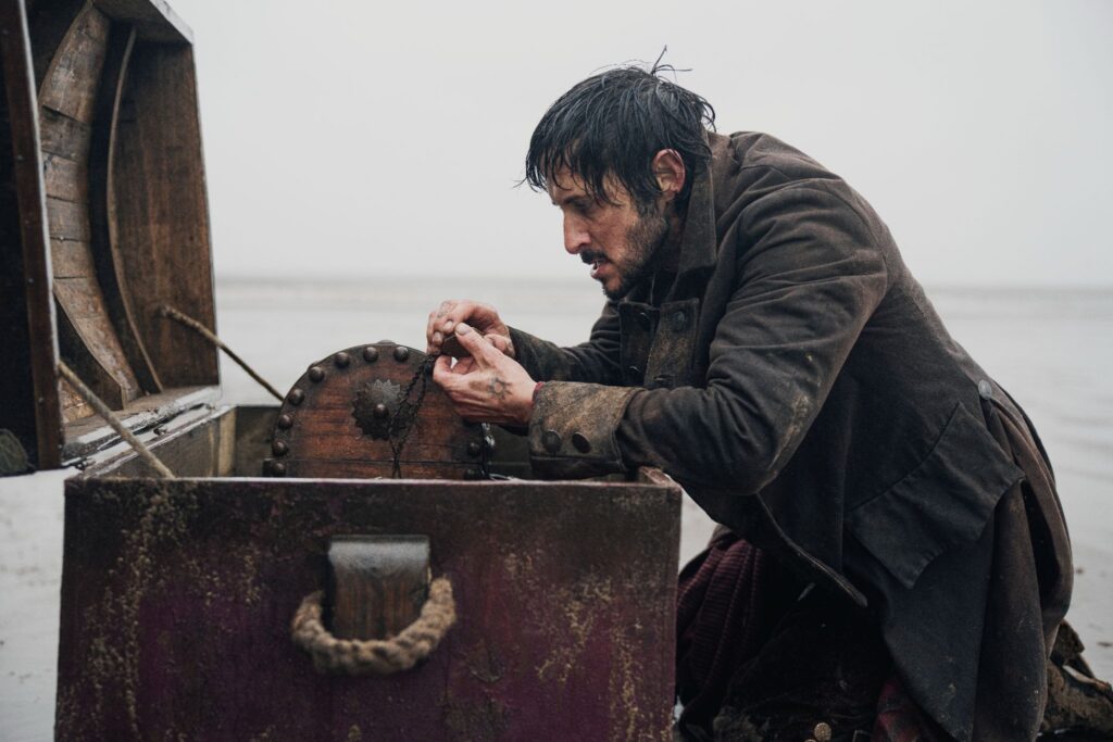 Tomer Capone as Billy Bones in a Treasure Island 2026 promotional still, accompanying a review analysis
