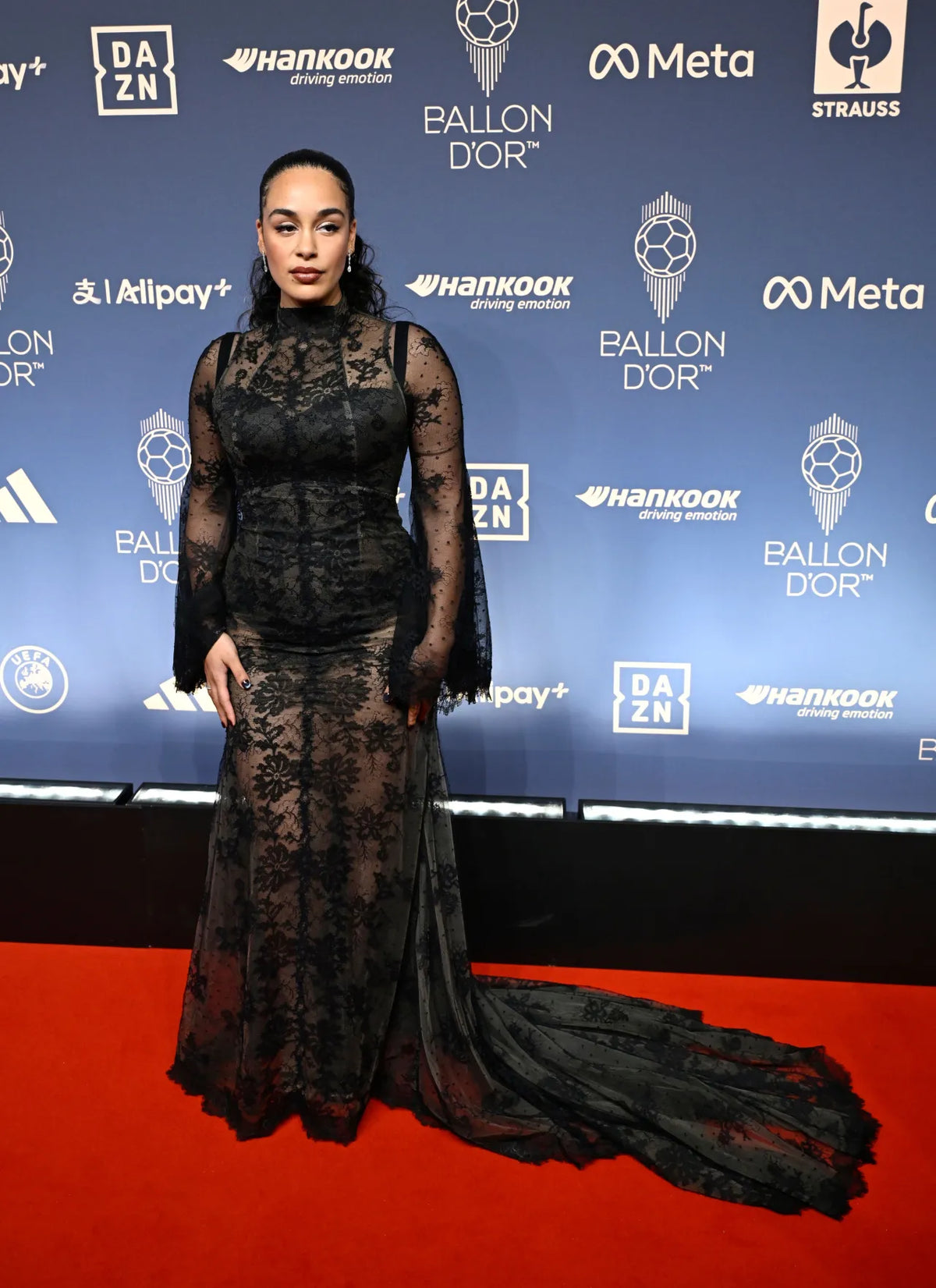 Jorja Smith in Azzopardi black lace gown at Ballon d'Or 2026