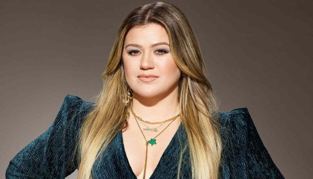 Kelly Clarkson pictured in a studio portrait as debate grows over her dispute with a Brooklyn small business