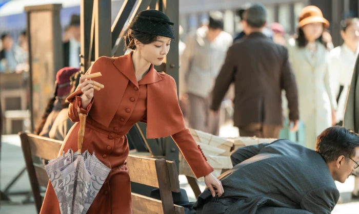 Kim You-jung in a rust-red period costume in 100 Days of Deception
